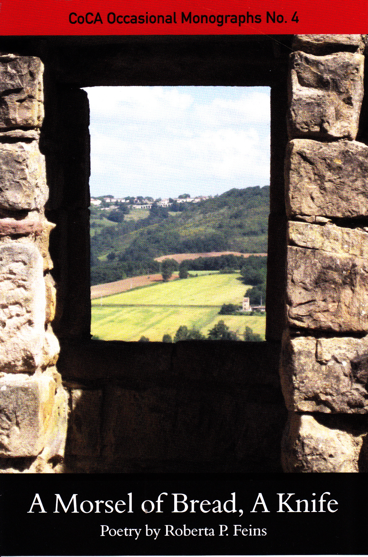 Photo of French Landscape through window in stone wall